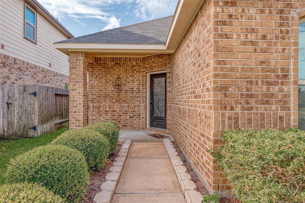 The welcoming front porch exudes charm the moment you arrive.