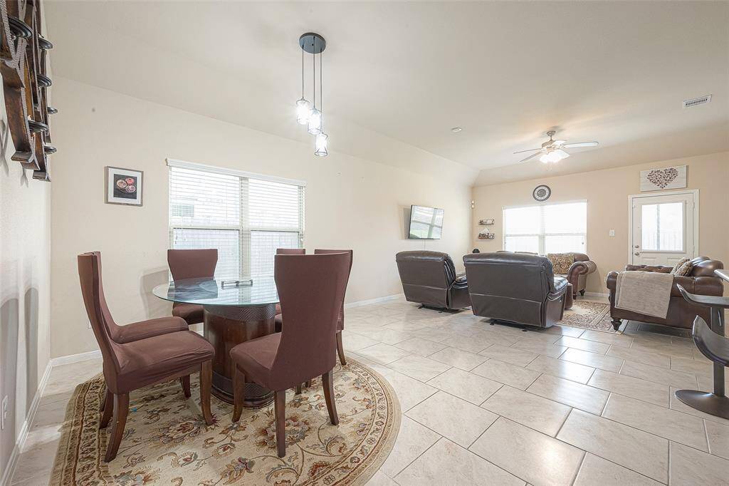 Family area open to the dining and kitchen.