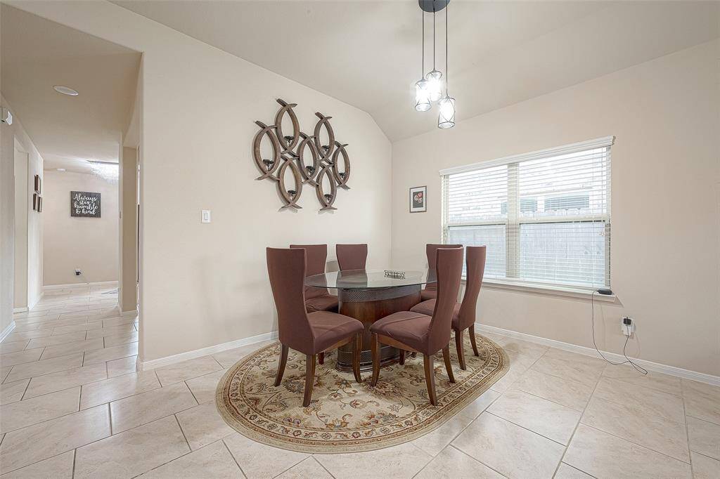 Formal dining area for everyday meals or special occasions.