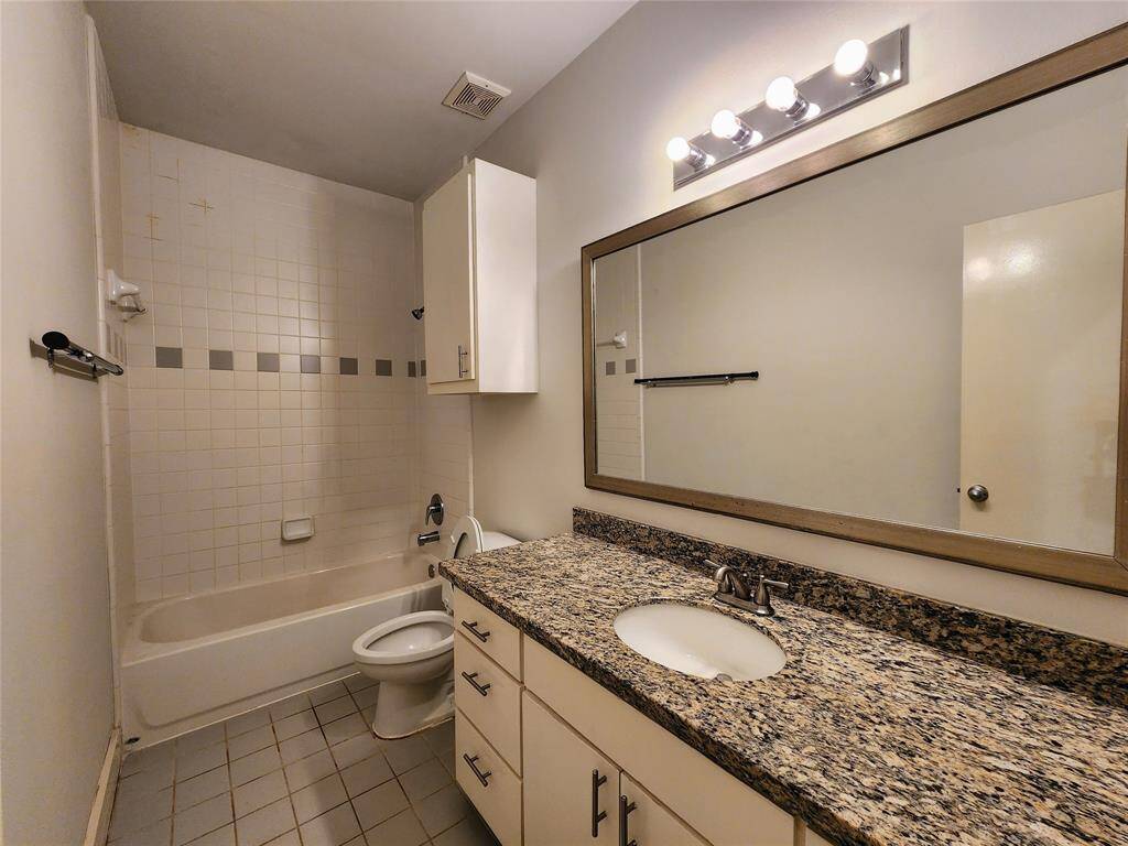 1st floor hall bath vanity and tub/shower