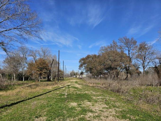 The area has a rural, open feel, suggesting a spacious, natural setting ideal for those seeking tranquility.