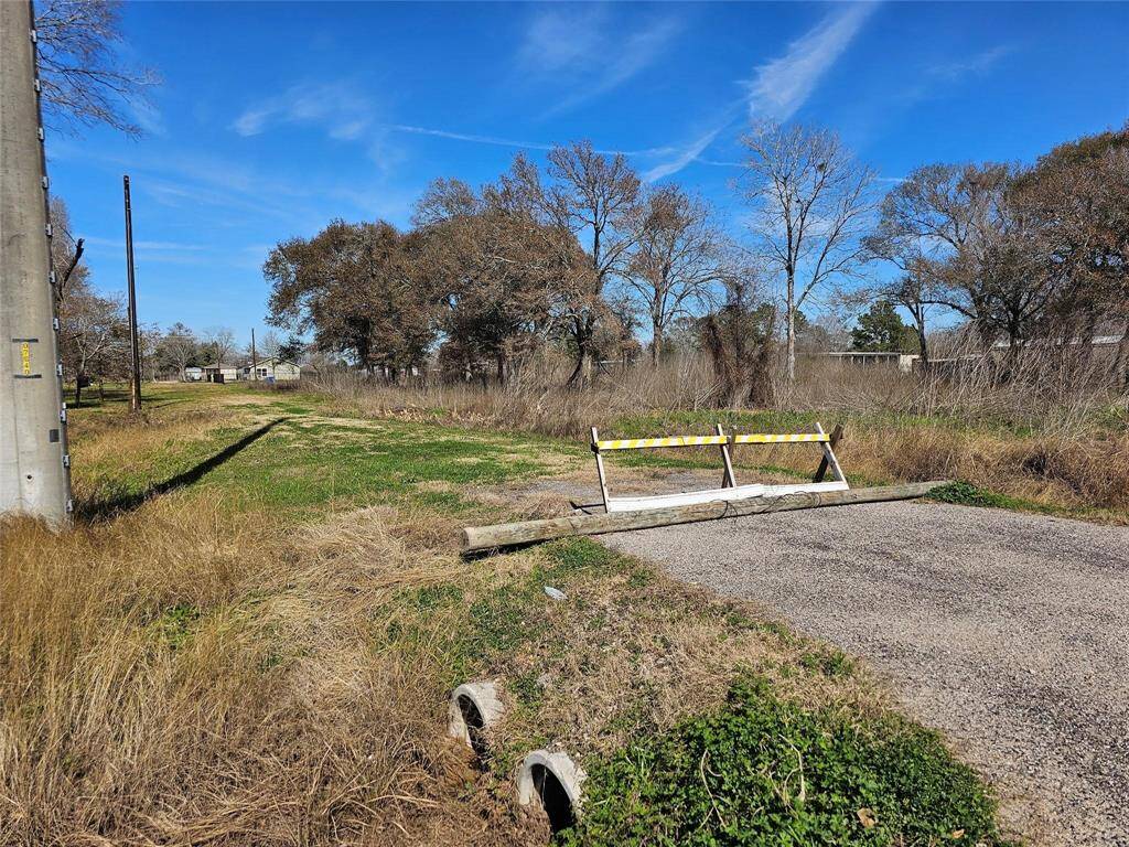 Colvert and driveway on each end.