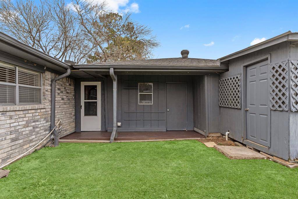 Covered entryway creating a welcoming entrance.