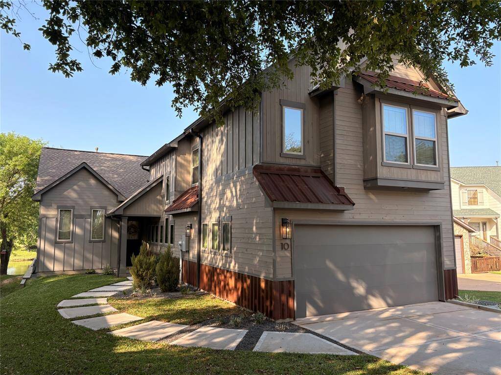 This beautiful custom Craftsman home sits on a quiet cul-de-sac in the community of Wildwood Shores on Lake Conroe. The custom builders thought of quality and design when building this home. Wildwood Shores is peaceful neighborhood that has so many amenities for all the family.