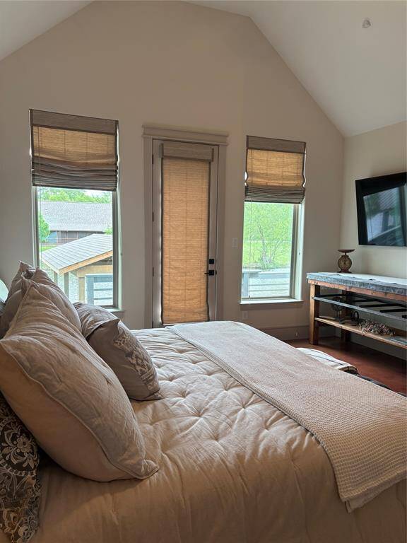 From this angle you can see the vaulted ceiling and large windows that take in the lake views and natural light.