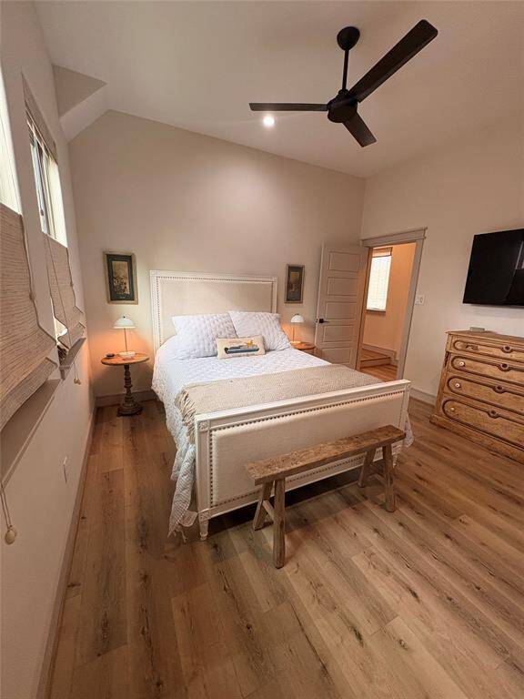 Another view of this bedroom. The bedrooms upstairs also have large walk in closets, ceiling fans, and custom blinds.
