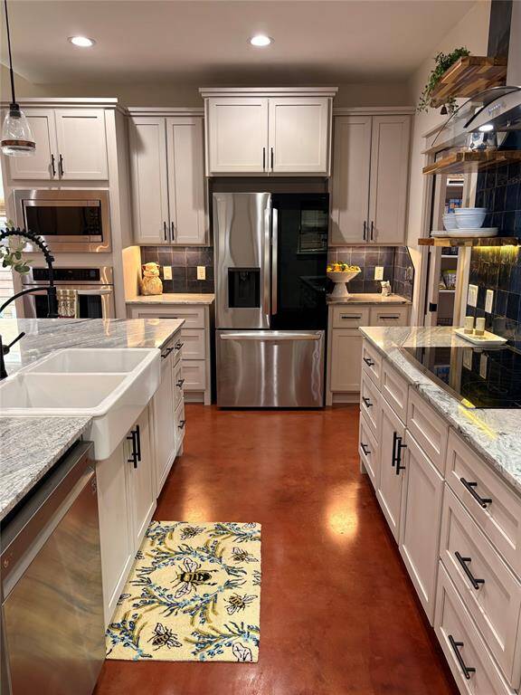In this picture you can see the durable pretty concrete floors. These floors are throughout the first floor and are so easy to maintain.