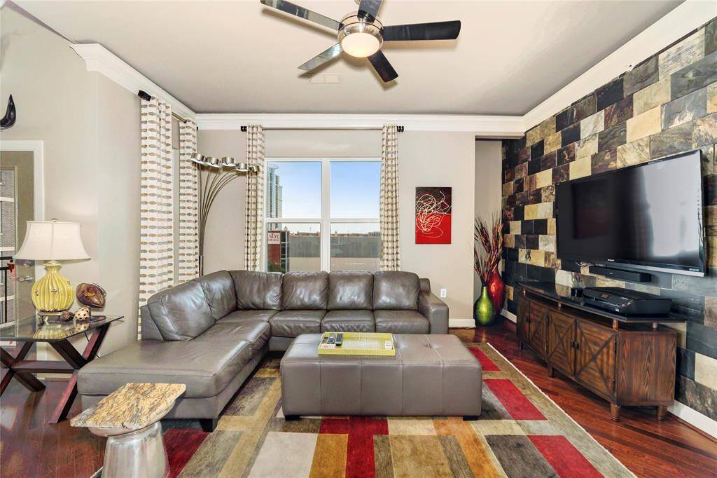 Welome to your living room with plenty of natural light from north-facing windows! Notice this space is large enough for full-sized sectionals and large furniture.
