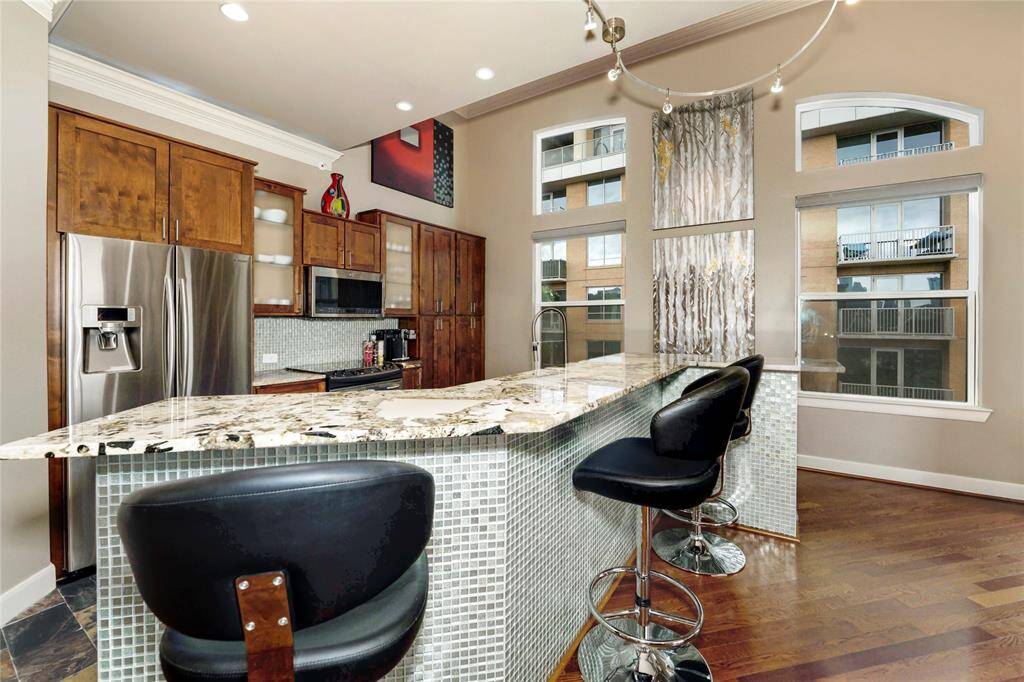 Breakfast bar can seat 4 people comfortably.