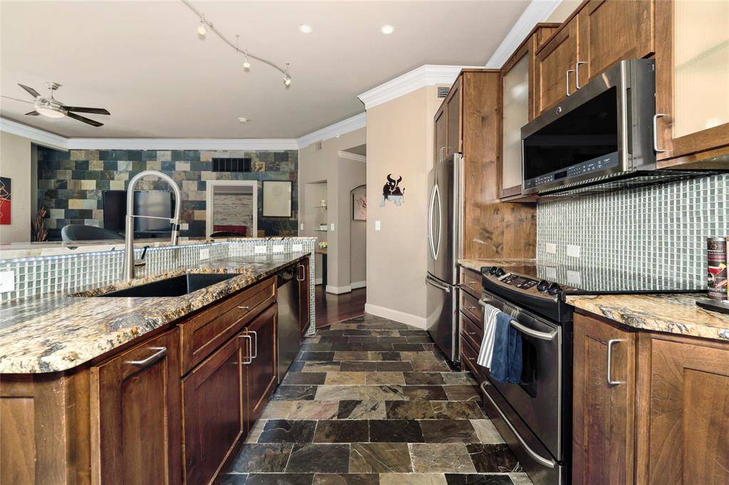 Reverse view of the kitchen with plenty of counter space as well.