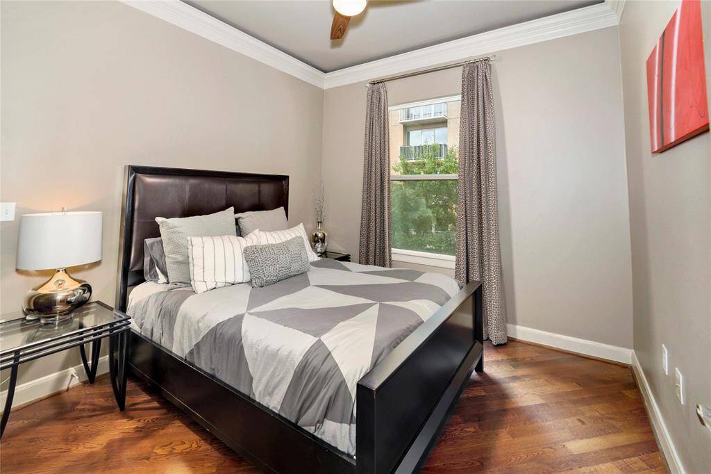 Secondary bedroom with western exposure and a built-in ceiling fan for maximum comfort.