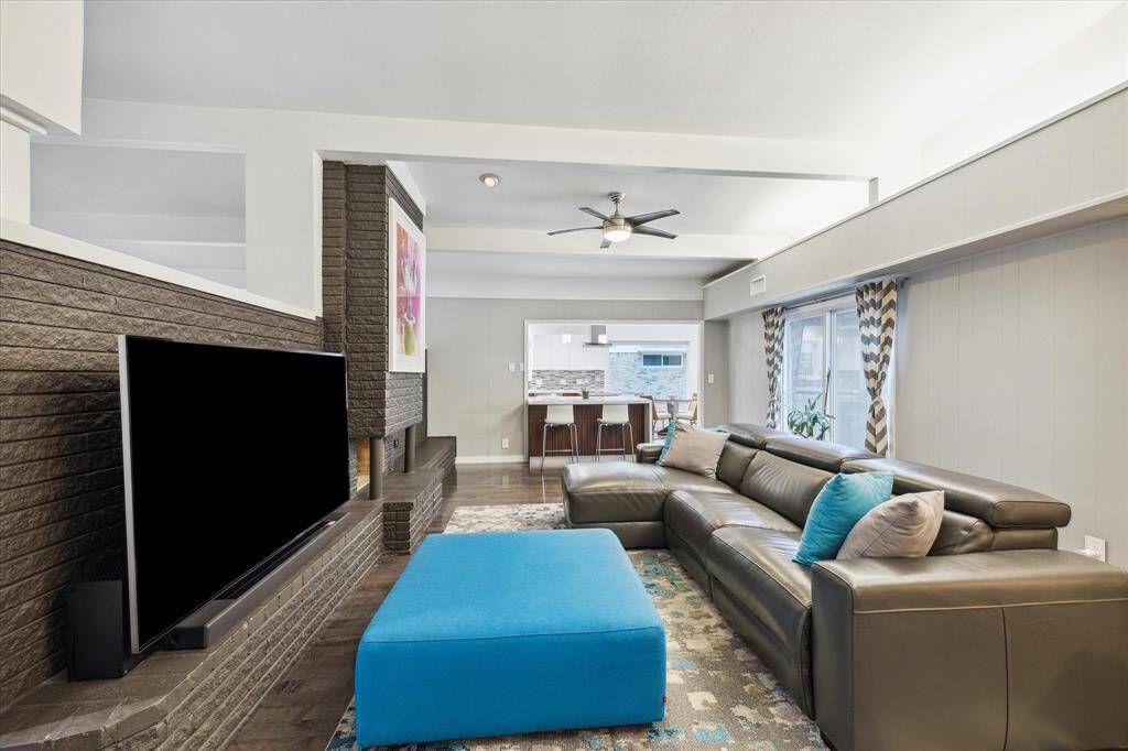 Den has open sight-lines to your kitchen