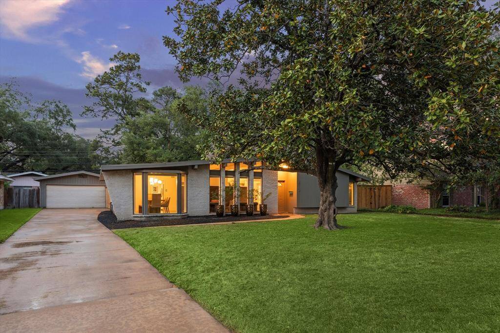 Long wide driveway leads to your detatched 2-car garage