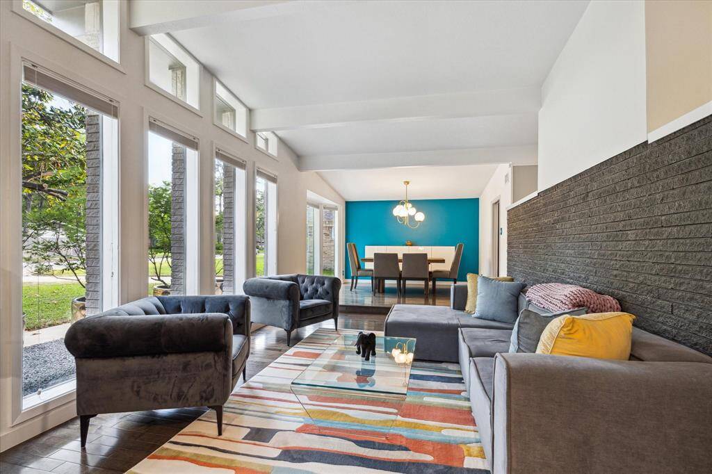Refreshing and modern, sloping ceiling lines and a wall of south facing windows