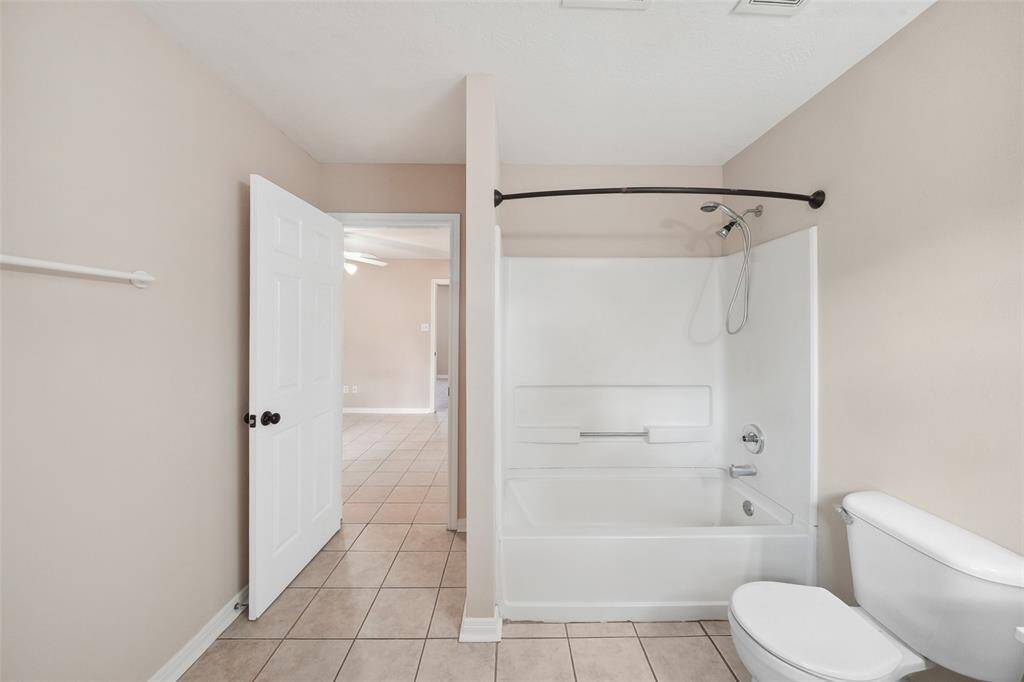 Primary bedroom has double closets.