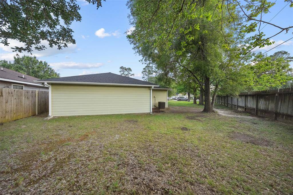 Back yard offers plenty of space for kids to play.