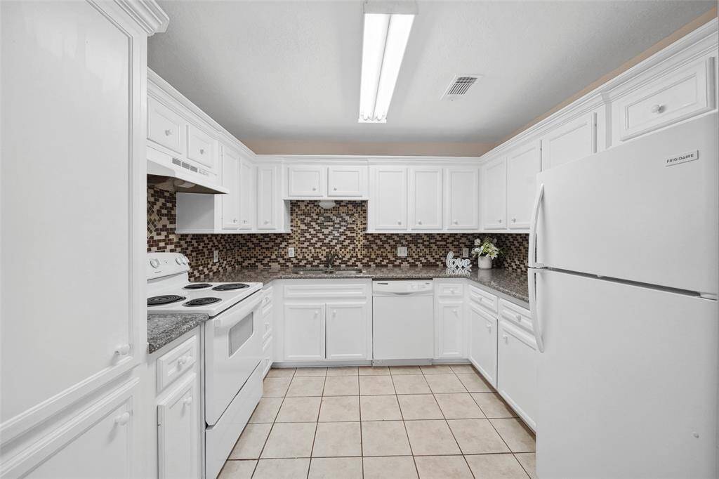 Tile flooring in kitchen.