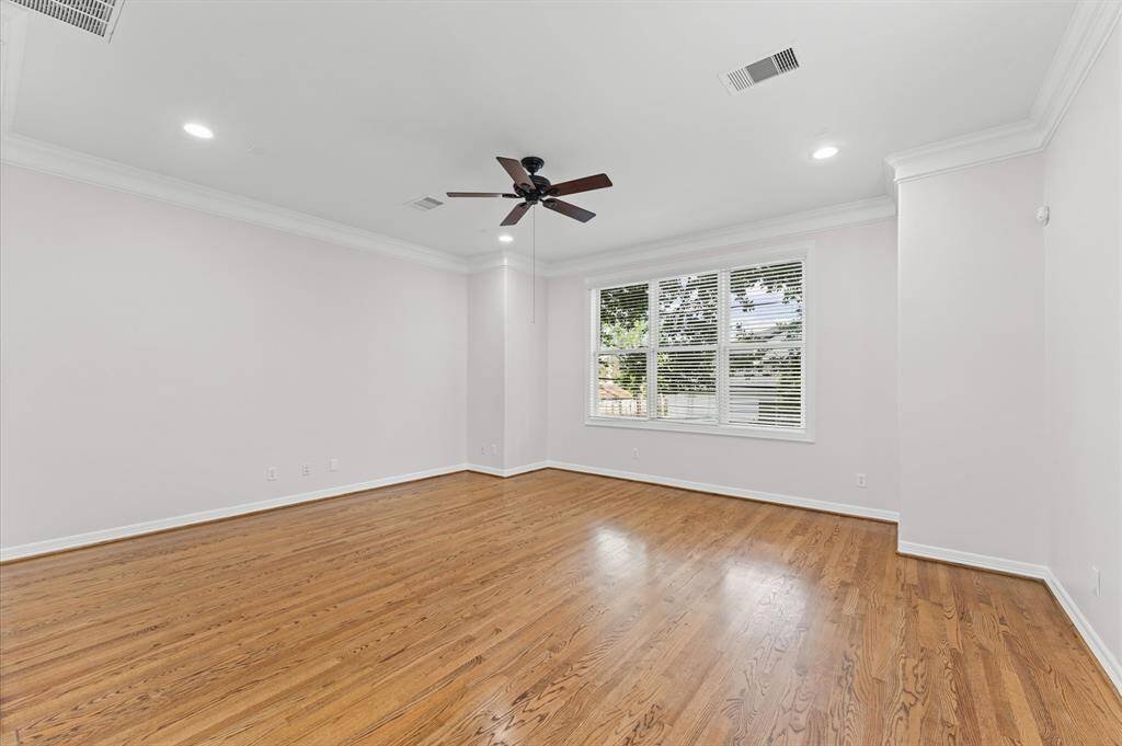 Fresh paint by Sherwin Williams gives this living room the light and bright feel with tree top views just outside the windows