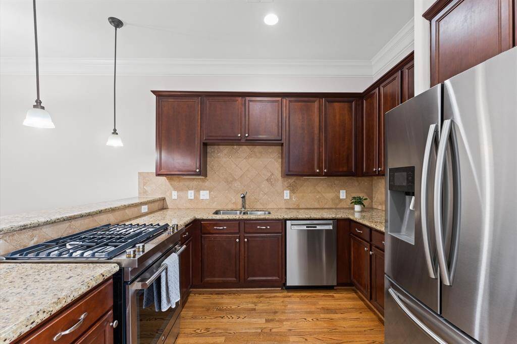 Kitchen is spacious with room for a breakfast nook