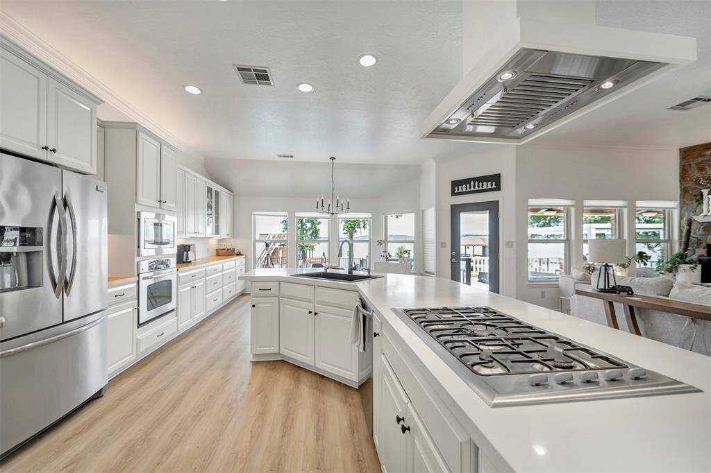 A chef’s dream kitchen — overflowing with cabinet space, endless counters, and room to create culinary magic