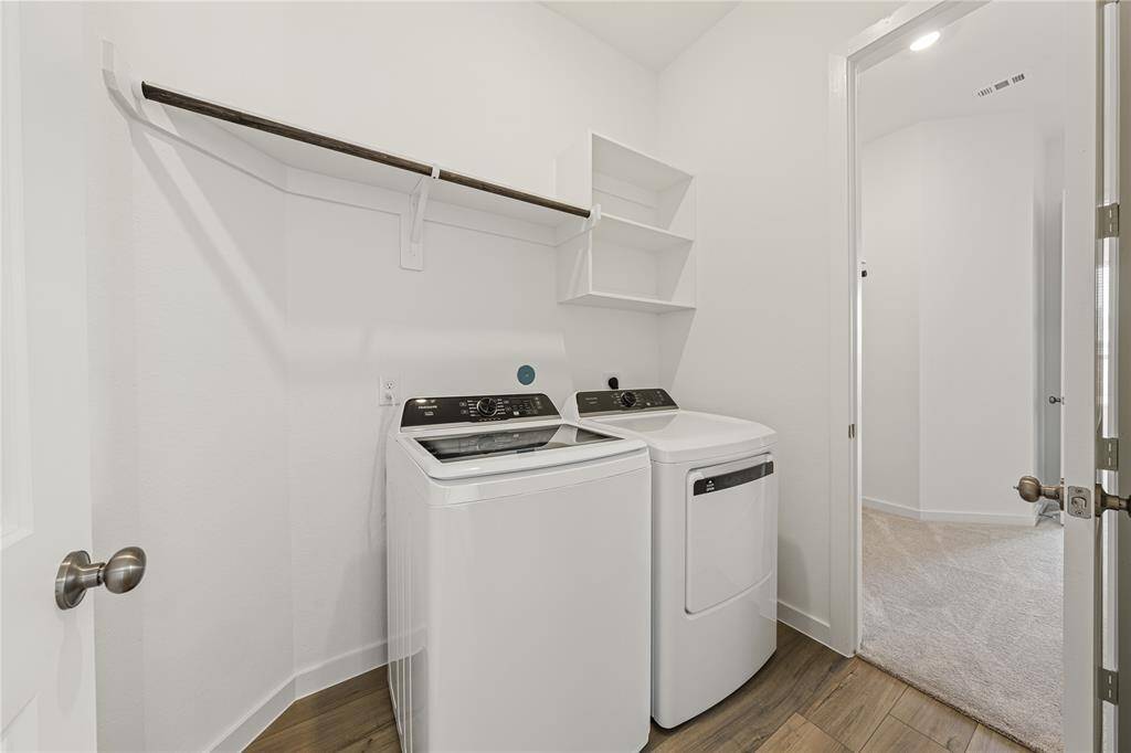Laundry with brand new washer and dryer