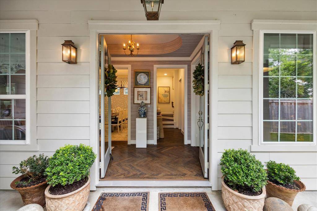 Step through the beautiful double glass doors and be instantly greeted by the stunning foyer of this exquisite home.