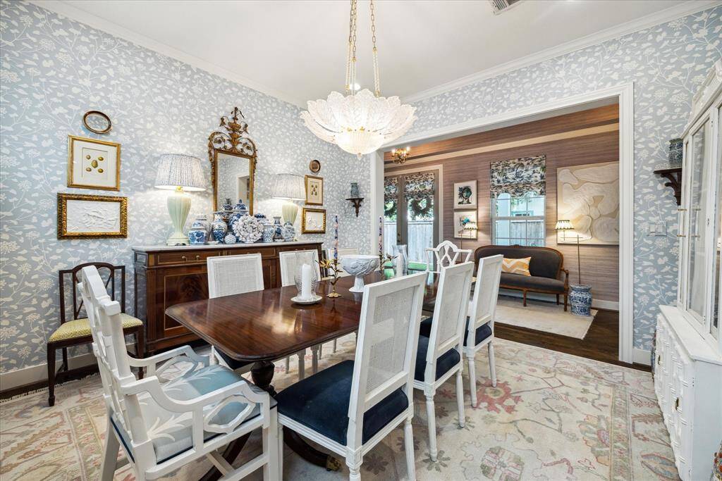 Formal dining exudes timeless elegance.  Note: The chandelier has been replaced with a beautiful Visual Comfort Chandelier (not pictured).