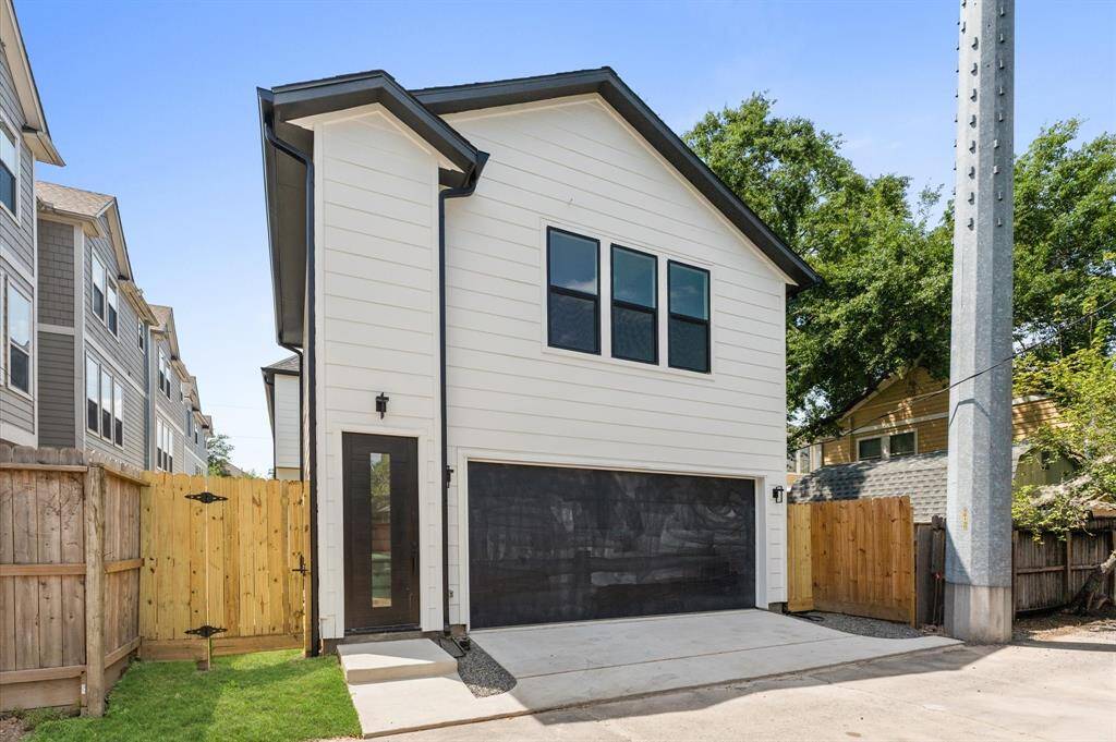 Two car garage with separate entrance to the fully finished garage apartment.