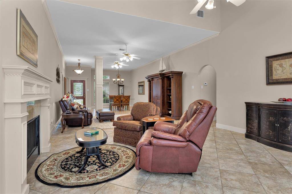 Experience the inviting charm of this expansive living area, perfect for relaxation and entertaining.
