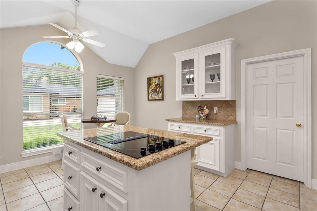 Spacious kitchen with abundant countertops for all your cooking needs.