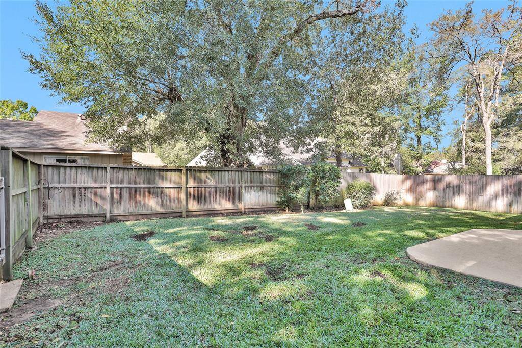 Expansive backyard with potential for an additional 10 feet of space by extending the fence.