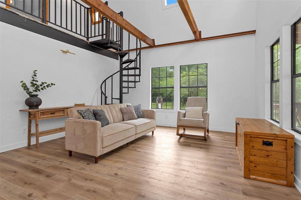 Welcome home. High ceilings and sunlit views bring an open, cheerful atmosphere to the heart of the home.