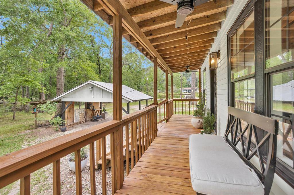 Charming front porch offers the perfect place to relax with a morning coffee or evening sunset view.