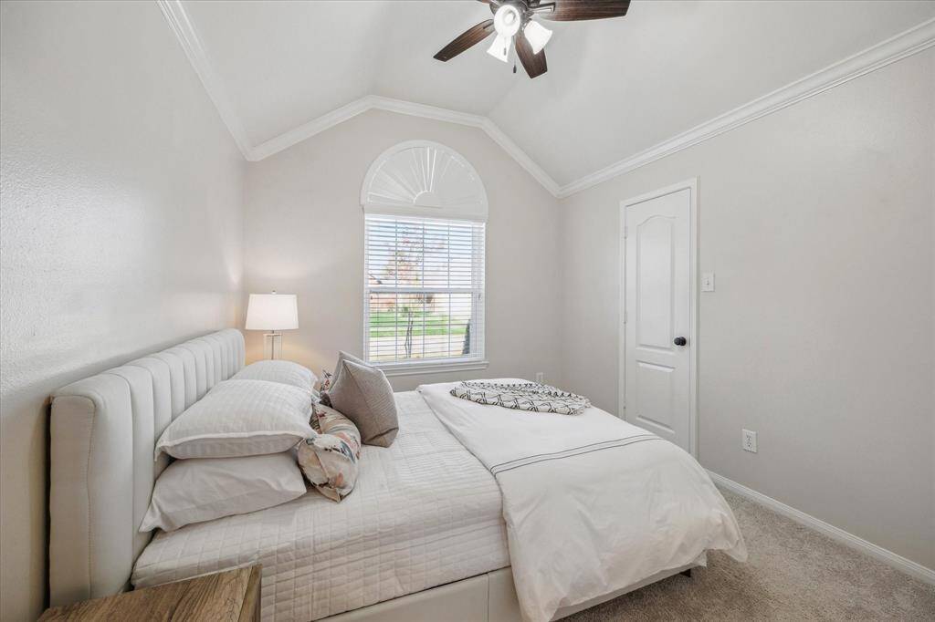 Secondary bedroom one, large enough for a king size bed and nightstands!