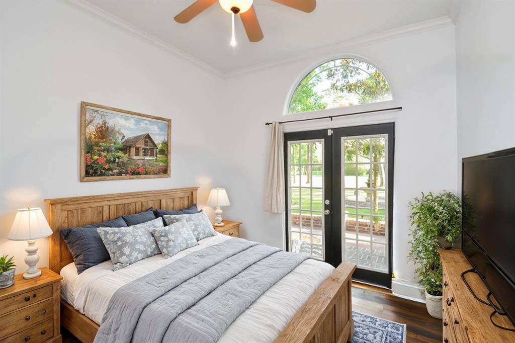 Virtually staged/ Guest room with a balcony.