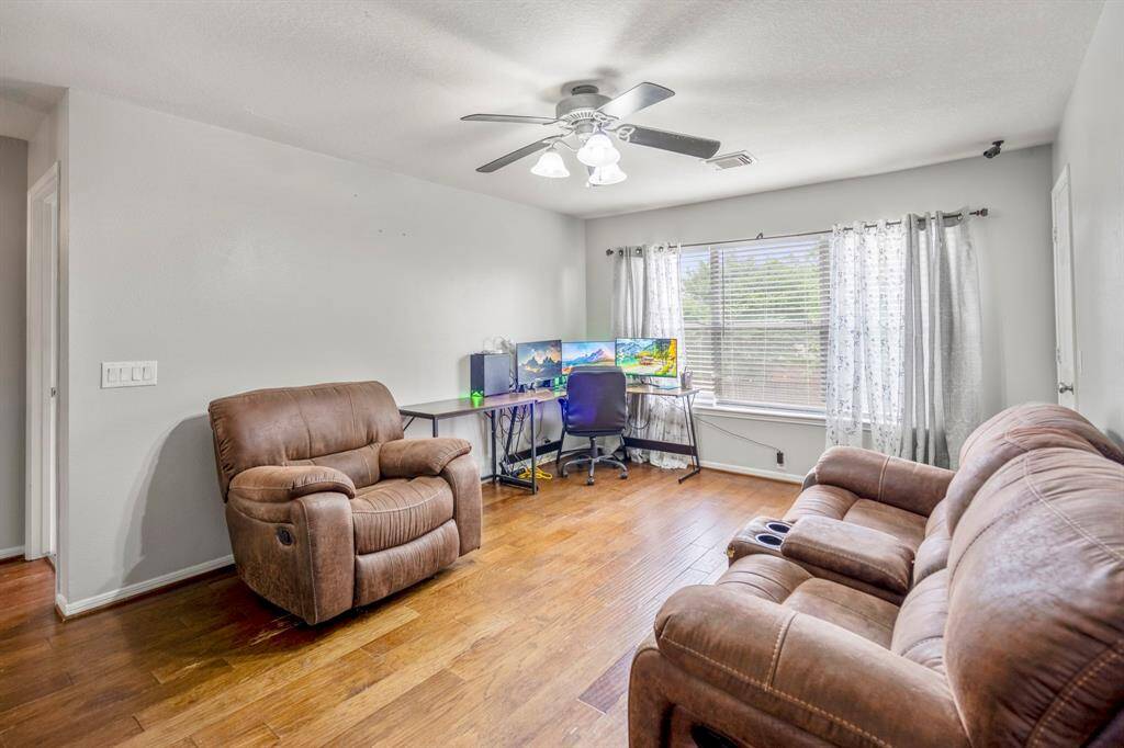 The large windows let in plenty of light, making it a great spot for relaxation.