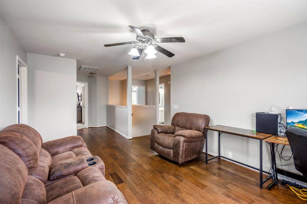 Another angle of the cozy living space showcases its flexibility.
