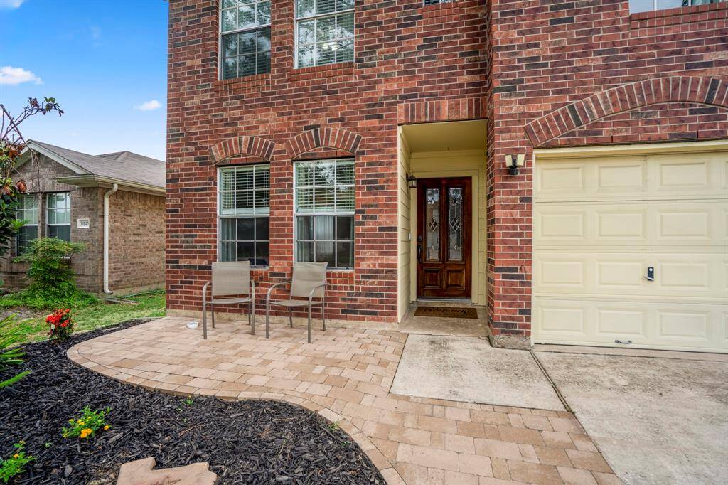 Enjoy outdoor living with this beautifully landscaped side yard.
