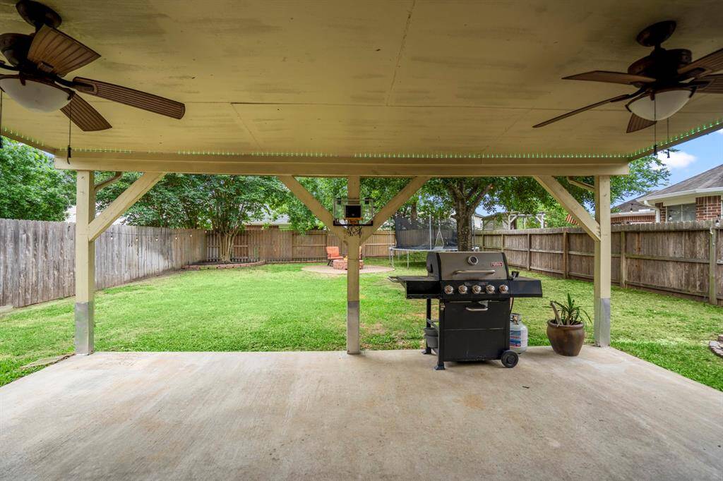 Experience the spacious backyard that offers plenty of room for outdoor activities.