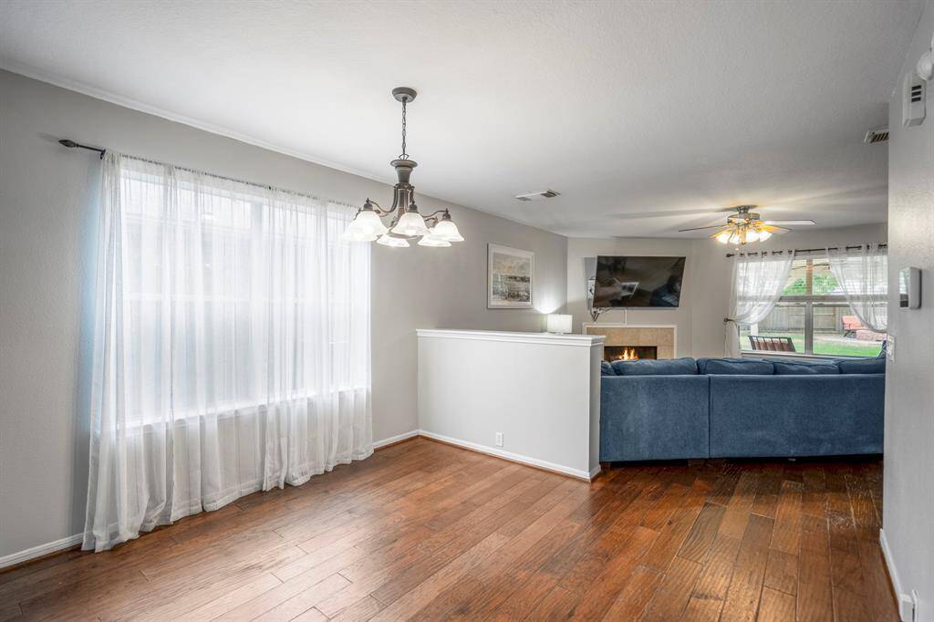 The dining area flows seamlessly into the kitchen, making hosting meals a delight.