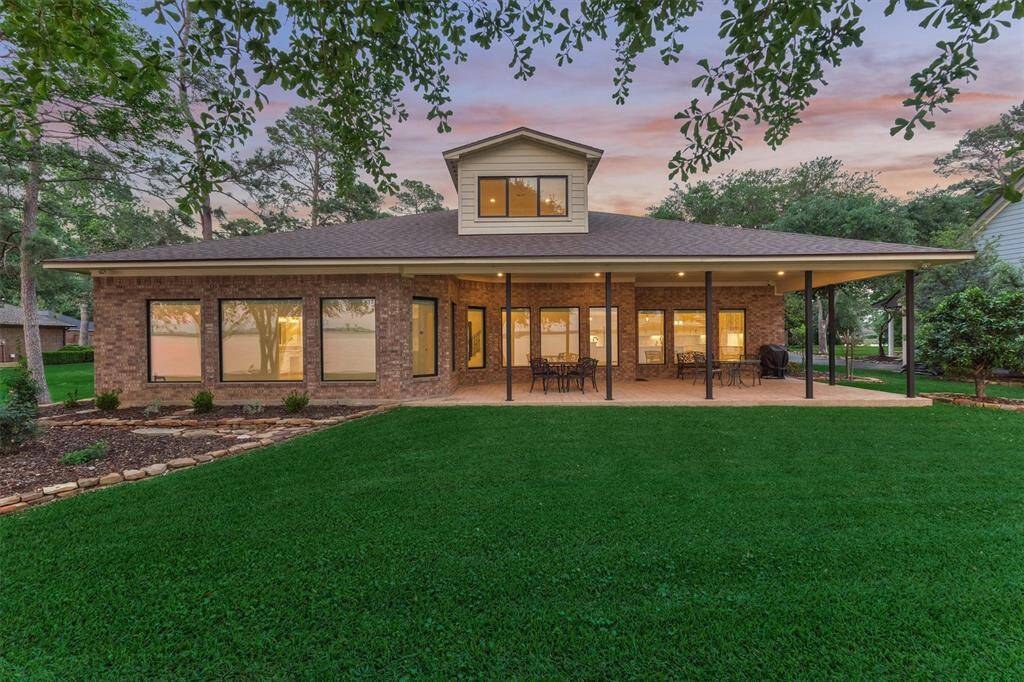 The back of the home was thoughtfully redesigned to include as many windows as possible, maximizing the stunning lake views. All doors and windows feature new energy-efficient seals, enhancing insulation and overall energy performance throughout the home.