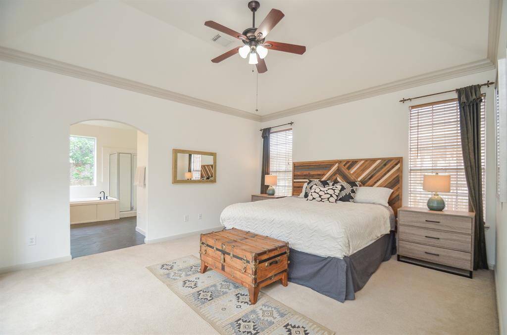Spacious primary bedroom with ensuite bath