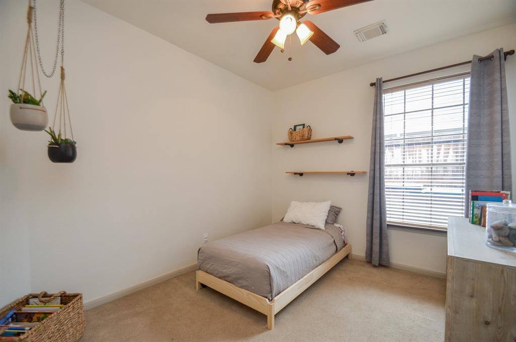 One of the secondary bedrooms next to the primary.