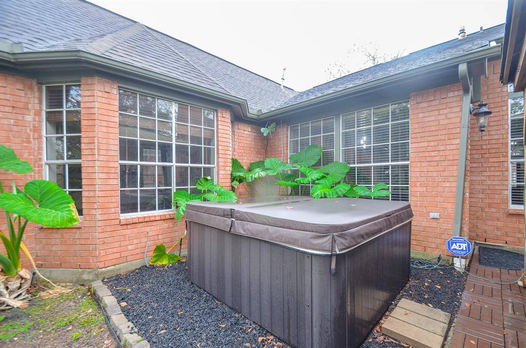Nearly new hot tub remains with property