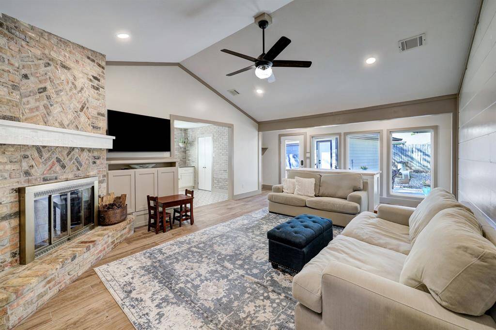 Flooded with natural light, the windows offer serene backyard views. Built-in mud-room, perfect space for shoes, backpacks, and more, not shown in the photo.