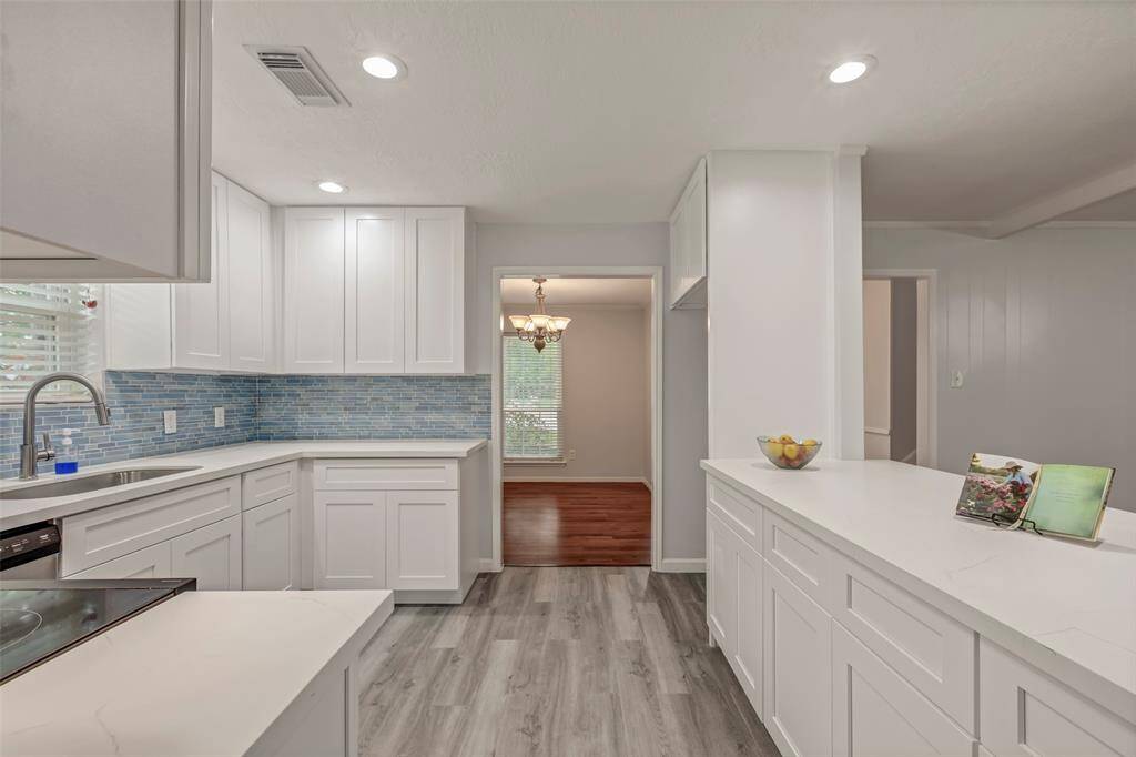 Chef's dream kitchen with new Quartz countertops, new cabinets, new stove and new flooring!
