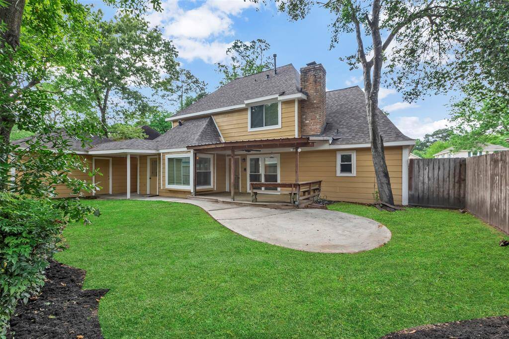 Magnificent backyard with covered deck and great green space