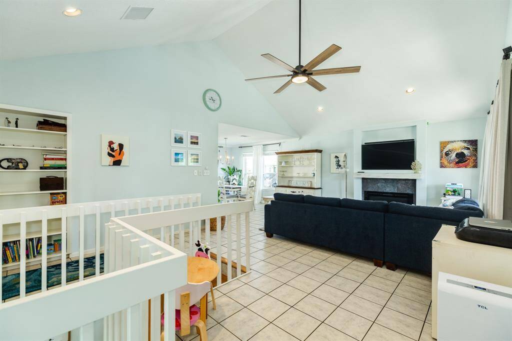 As you can see, the upstairs living room is open to the dining area.
