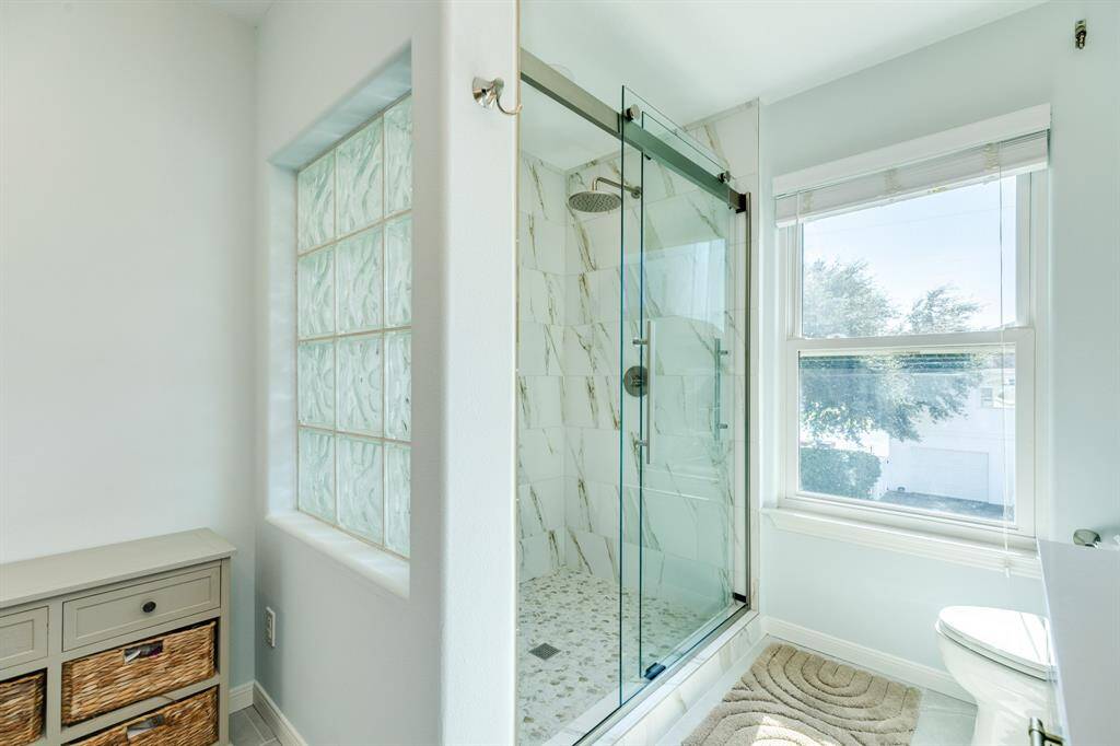 Primary bath, large walkin shower.