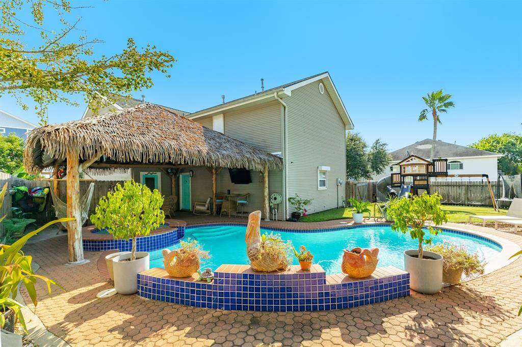 Need to cool off or relax outside in privacy? Just step outside to your backyard oasis.
